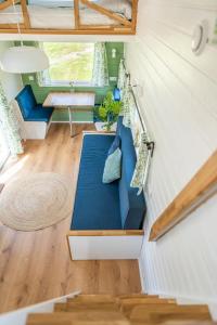 Green Tiny House with shared pool