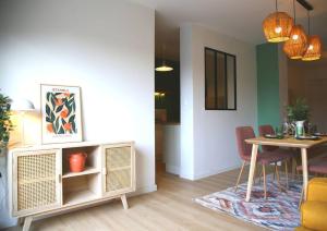 Appartements L'Eden Chic - Balneo - Jardin - Parking gratuit : photos des chambres