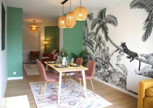 Appartements L'Eden Chic - Balneo - Jardin - Parking gratuit : photos des chambres