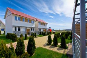 Słoneczna Kajuta - ApartmentyDomki