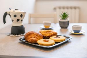 Travel & Station Apartment by Pleiades Home