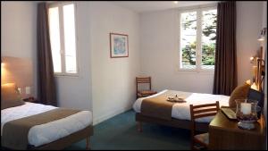 Hotels Hotel Notre Dame de la Sarte : photos des chambres