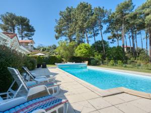 Maisons de vacances Holiday Home Eden Parc by Interhome : photos des chambres