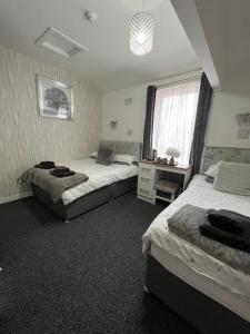 Small Family Room (2 Adults + 1 Child) room in The Carlton