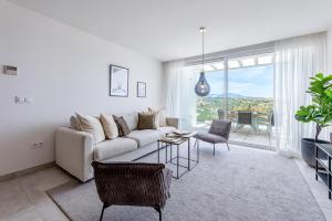 797 Holiday Rentals- Moderno piso con vistas al golf y mar