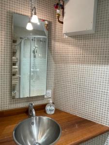 Appartements Des Fleurs et des Vagues : photos des chambres