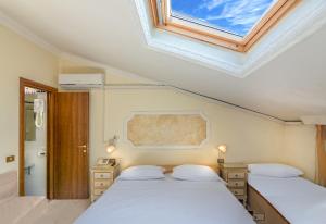 Economy Quadruple Room - Attic