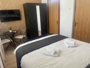 Studio 27mp - Dormitor cu baie proprie - Balcon - Bucatarie complet utilata