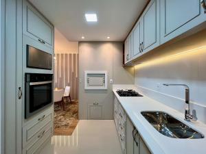 Reserva das Orquídeas 1 dorm by Achei Gramado