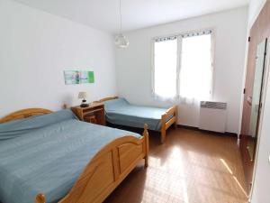 Maisons de vacances Maison 4 pieces Saint-Trojan - Terrasse, Parking, 6 Couchages - FR-1-246A-247 : photos des chambres