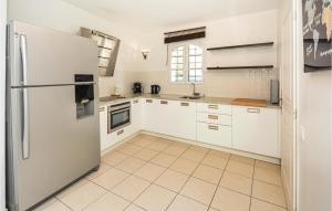 Maisons de vacances Nice home in Aigues-Mortes with 3 Bedrooms and WiFi : photos des chambres