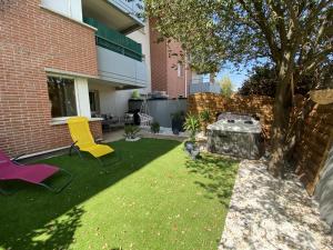 Appartements Le Jungle : T2 avec jardin et jacuzzi : photos des chambres