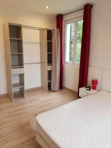 Appartements 05 - Tres joli 3 pieces neuf 2 chambres vue jardin avec parking privatif gratuit : photos des chambres