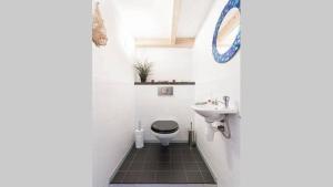 Benedenverdieping in Woonboot met tuinterras