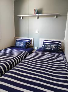 Appartements Mobil Home Camping Mar Estang 4* : photos des chambres