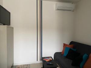 Appartements Au pied du centre ville - Mignon petit studio climatise : photos des chambres