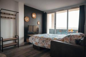 Appartements Le Rose - Centre Ville - Wifi : photos des chambres