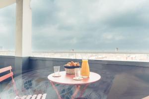 Appartements Le Rose - Centre Ville - Wifi : photos des chambres