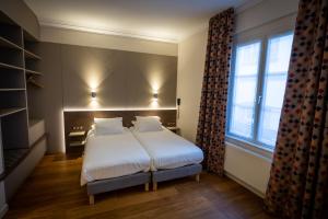 Hotels Logis Hotel de la Tour : photos des chambres