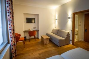 Hotels Logis Hotel de la Tour : photos des chambres