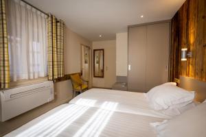 Hotels Hotel De La Tour : photos des chambres