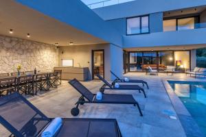 Luxury beachside villa with a pool and a sea view