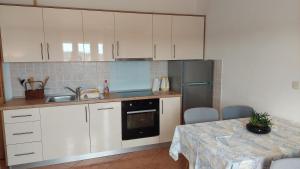 Apartments Donadic I, Caska