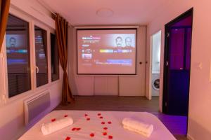 Appartements Spa & Detente - Cinema - Parking - Gare : photos des chambres