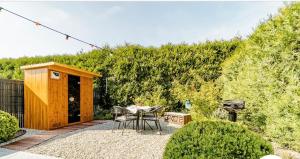 Roulotte du puits avec jacuzzi et sauna privatif