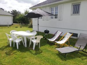 Maisons de vacances L'Opaline, Jolie Maison avec Jardin 6 pers,10km Honfleur, linge et internet inclus : photos des chambres