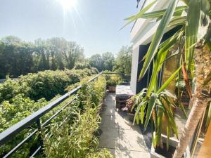 LOlympique: appartement cosy, vue canal grande terrasse et parking