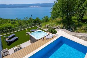 Villa Maruncela with sea and island views, 5 bedrooms, private pool, gym