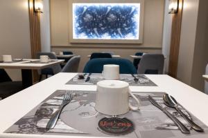 Hotels Hotel De L'univers : photos des chambres