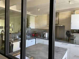 Maisons de vacances Charmante echoppe avec piscine Comme un air de campagne en ville : photos des chambres