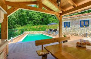 Cozy holiday house CAPREE with pool in a quiet location near the beach Rabac