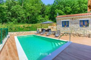 Cozy holiday house CAPREE with pool in a quiet location near the beach Rabac
