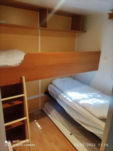 Campings Camping le caminel Mobile home 97 : photos des chambres