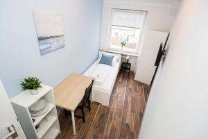 Zentral gelegene Zimmer mit Gemeinschaftsbad und Küche