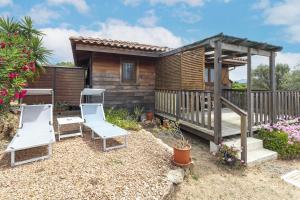 Maisons de vacances Petite Maison En Bois Exotique : photos des chambres