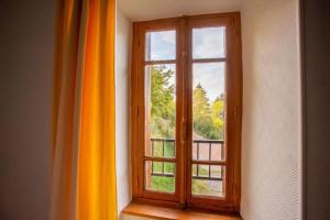 Appartements Maison De Caractere- Puy De Dome : photos des chambres