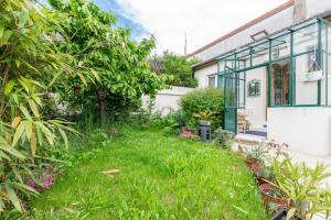 Maisons de vacances La Maisonnette-Wifi Fibre-Netflix-Jardin-BBC : photos des chambres