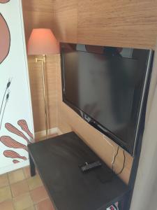 Maisons de vacances Ravissante suite avec parking prive : photos des chambres