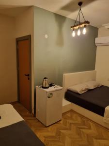 Triple Room with Balcony room in El Mundo Suites