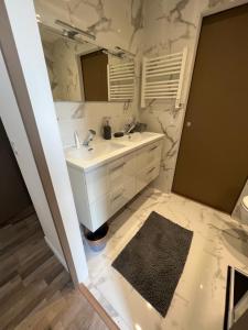 Appartements Appartement spacieux et agreable : photos des chambres