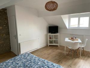 Appartements Studio - hyper centre Milly : photos des chambres