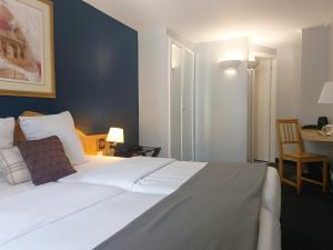 Hotels Grand Hotel Du Calvados : photos des chambres