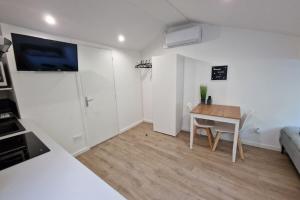 Appartements Le petit Strasbourg- Studio renove-3pers-Caluire : photos des chambres