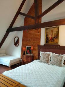 Maisons d'hotes Chateau de Sainte Colombe Sur Gand : photos des chambres