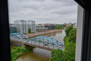 Odra Tower Apartments with FREE GARAGE Wrocław by Renters