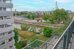 Odra Tower Apartments with FREE GARAGE Wrocław by Renters
